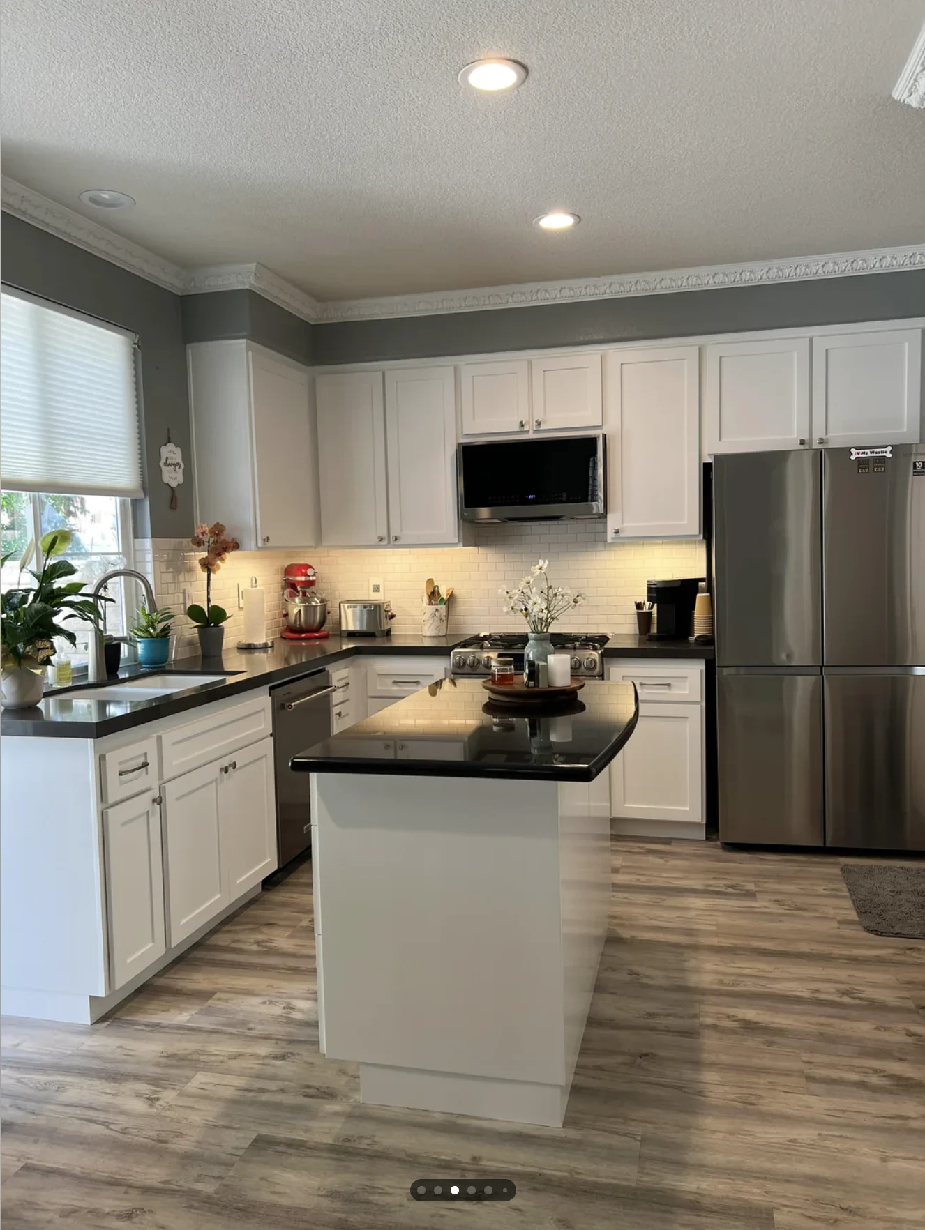 White home kitchen before a cabinet color refresh.